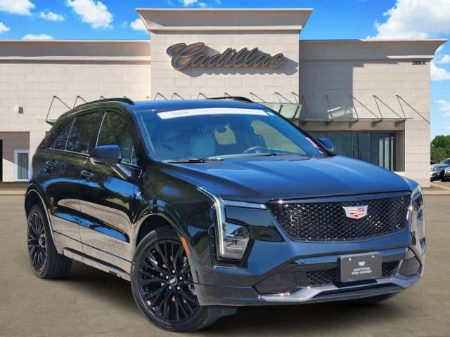 2024 Cadillac XT4 Sport in Stellar Black Metallic — front three-quarter view