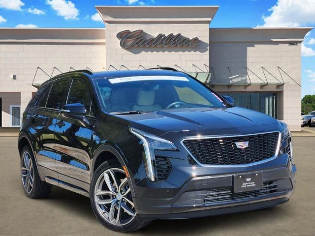 2023 Cadillac XT4 Sport in Stellar Black Metallic — front three-quarter view
