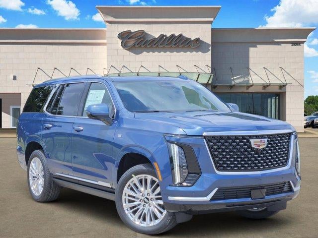 2026 Cadillac Escalade Luxury in Deep Sea Metallic — front three-quarter view
