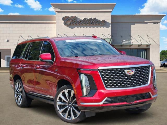 2025 Cadillac Escalade Premium Luxury in Radiant Red Tintcoat — front three-quarter view
