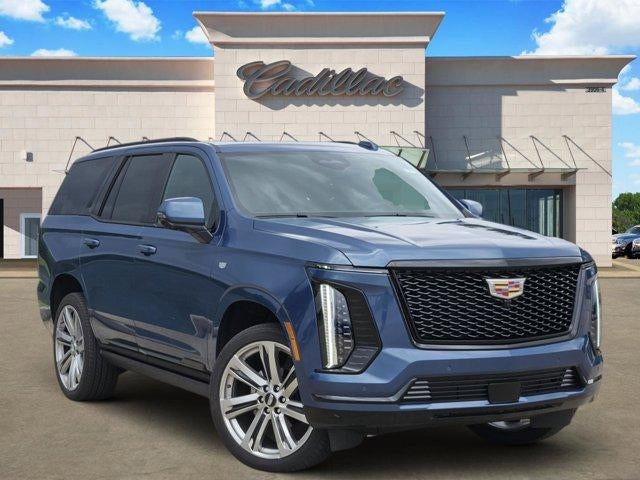 2026 Cadillac Escalade Sport in Deep Sea Metallic — front three-quarter view
