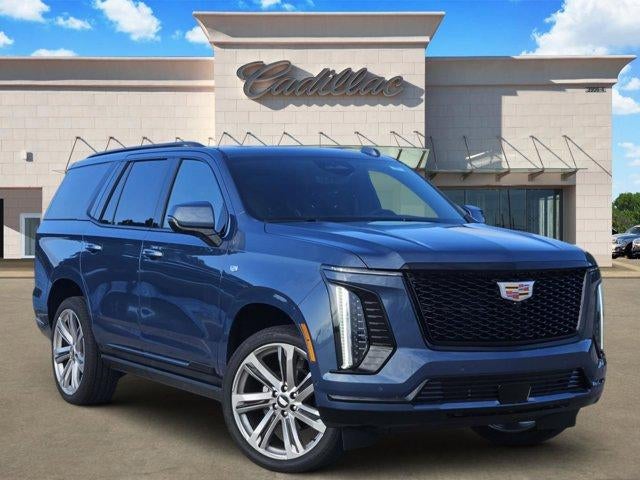 2026 Cadillac Escalade Sport in Deep Sea Metallic — front three-quarter view