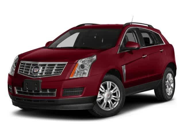 2014 Cadillac SRX Performance Collection in Crystal Red Tintcoat — front three-quarter view