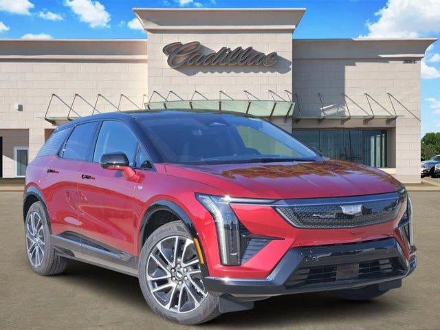 2026 Cadillac OPTIQ Sport in Radiant Red Tintcoat — front three-quarter view